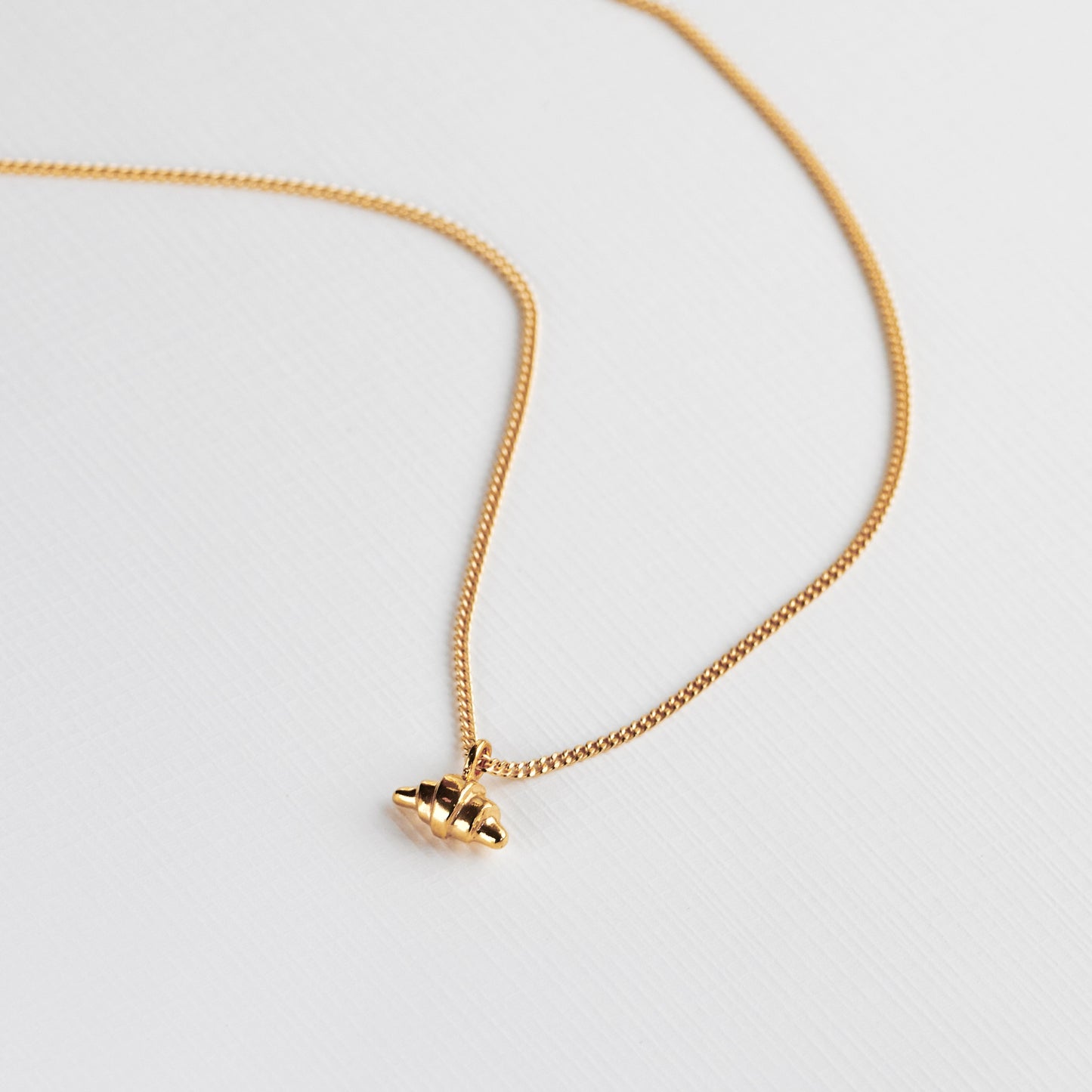 GOLD CROISSANT NECKLACE