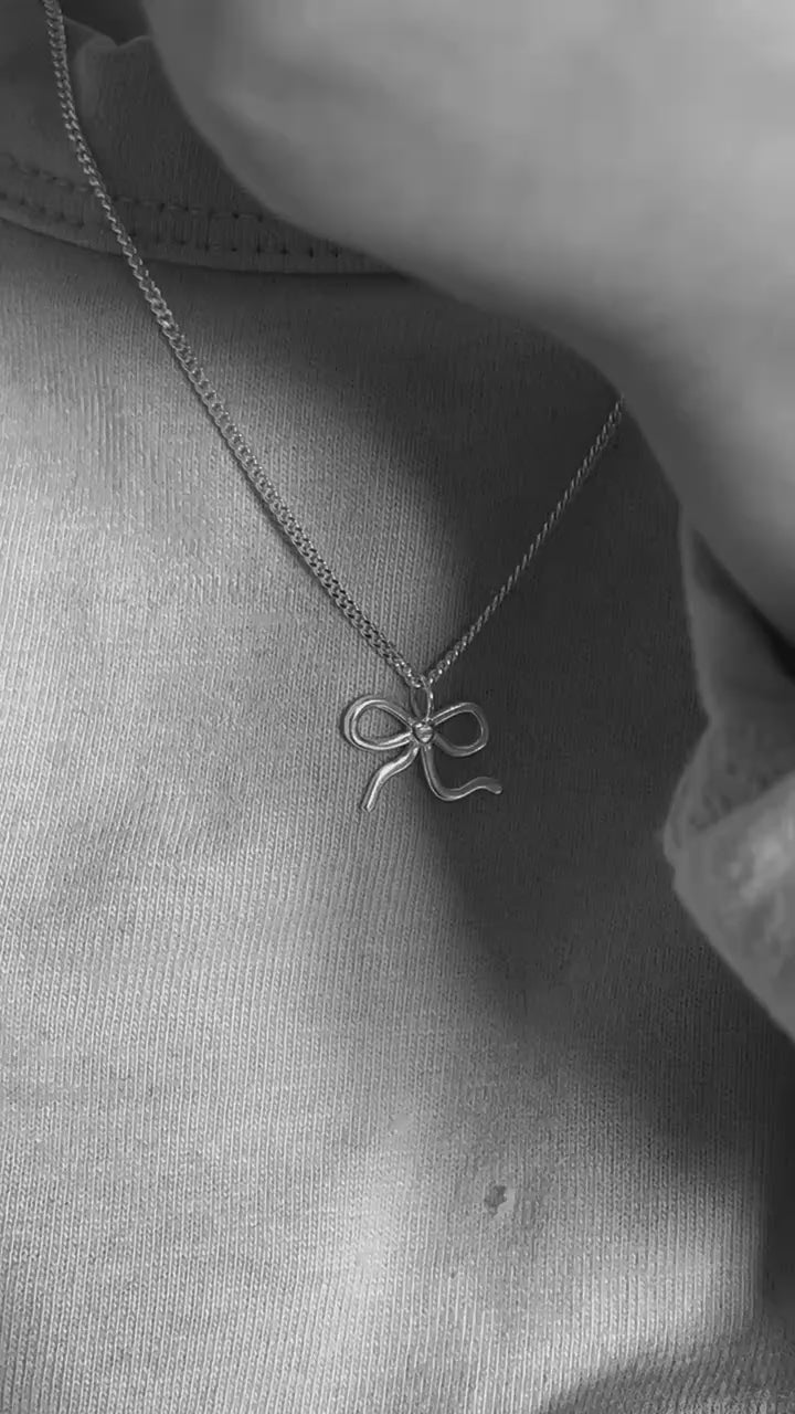 SILVER BOW NECKLACE